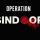 Operation Sindoor logo with white bold letters and red sindoor powder replacing the second O on a black background